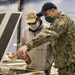 Sailor conducts maintenance
