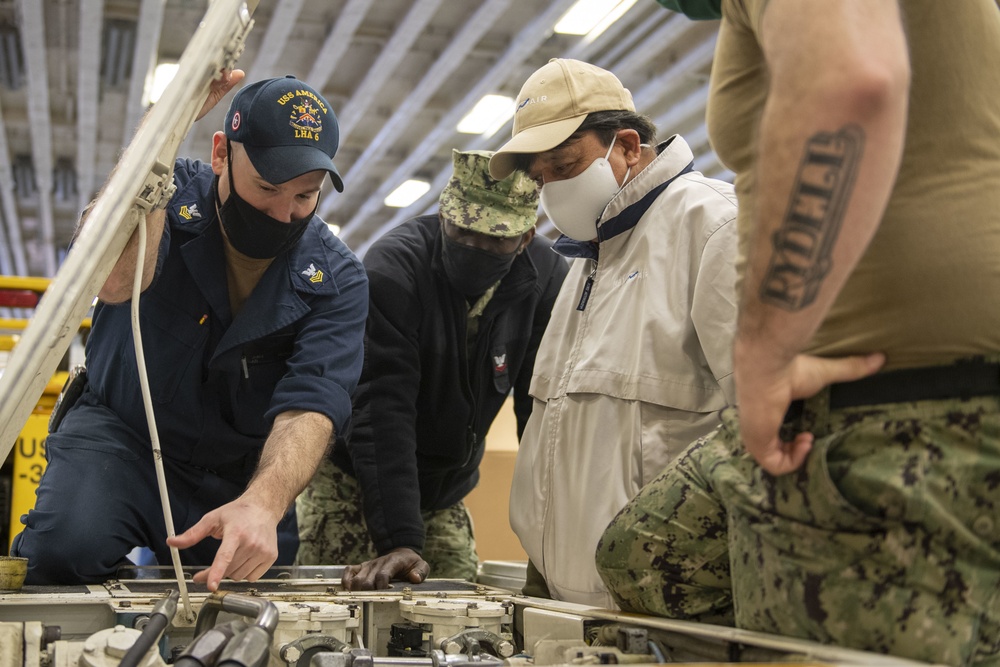 Sailors conduct maintenance