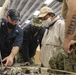 Sailors conduct maintenance