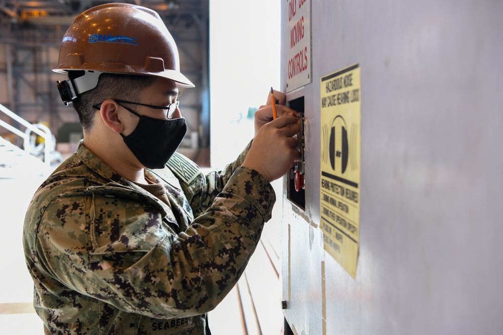 NAVFAC Far East Repairs Hangar Door