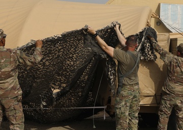 Army Reserve Soldiers deployed to Camp Arifjan set up Early Entry Command Post