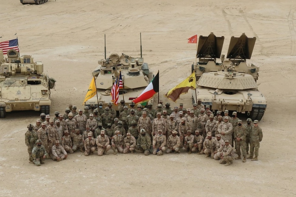 U.S. Soldiers Of Task Force Iron Castle and Task Force Spartan collaborate with Kuwaiti Land Forces (KLF) for the celebration of the 30th anniversary of Kuwait’s Liberation Day and Operation Desert Storm.