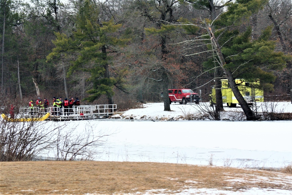 Fort McCoy firefighters practice surface ice rescue training at post's Swamp Pond