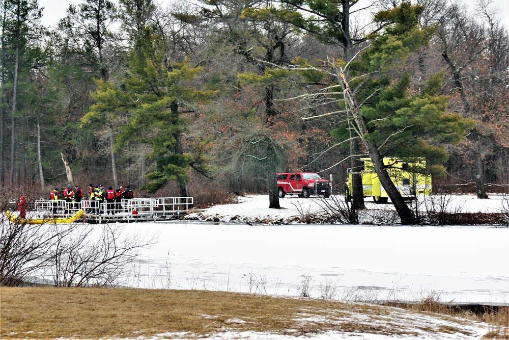 Fort McCoy firefighters practice surface ice rescue training at post's Swamp Pond