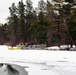 Fort McCoy firefighters practice surface ice rescue training at post's Swamp Pond