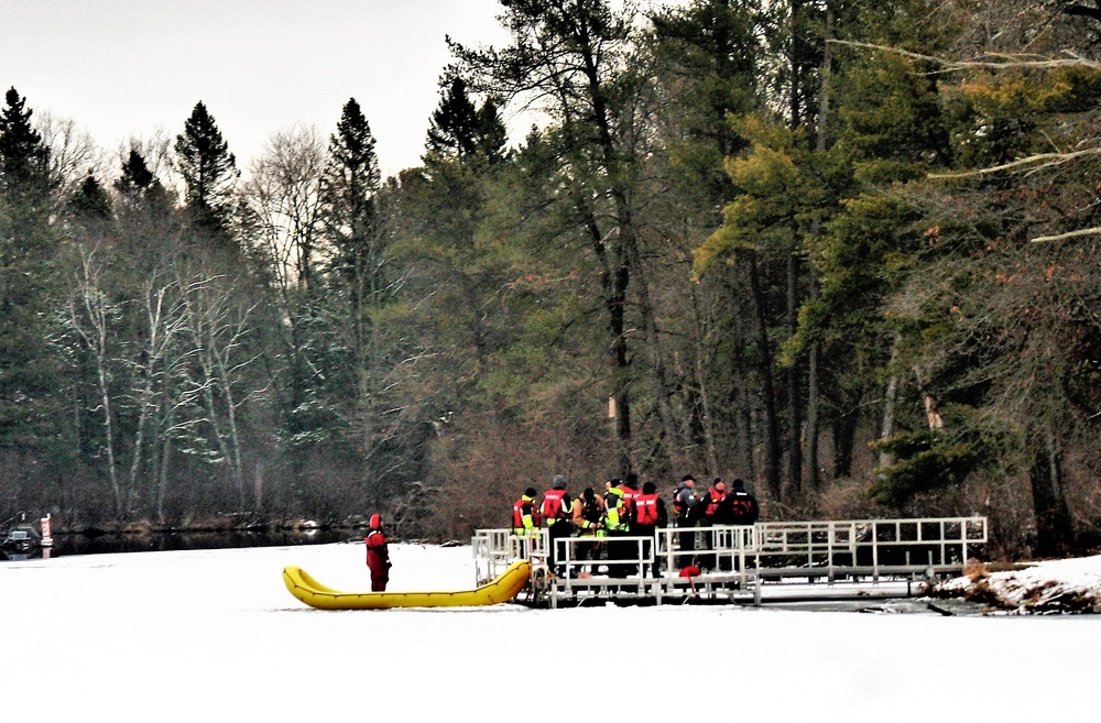 Fort McCoy firefighters practice surface ice rescue training at post's Swamp Pond