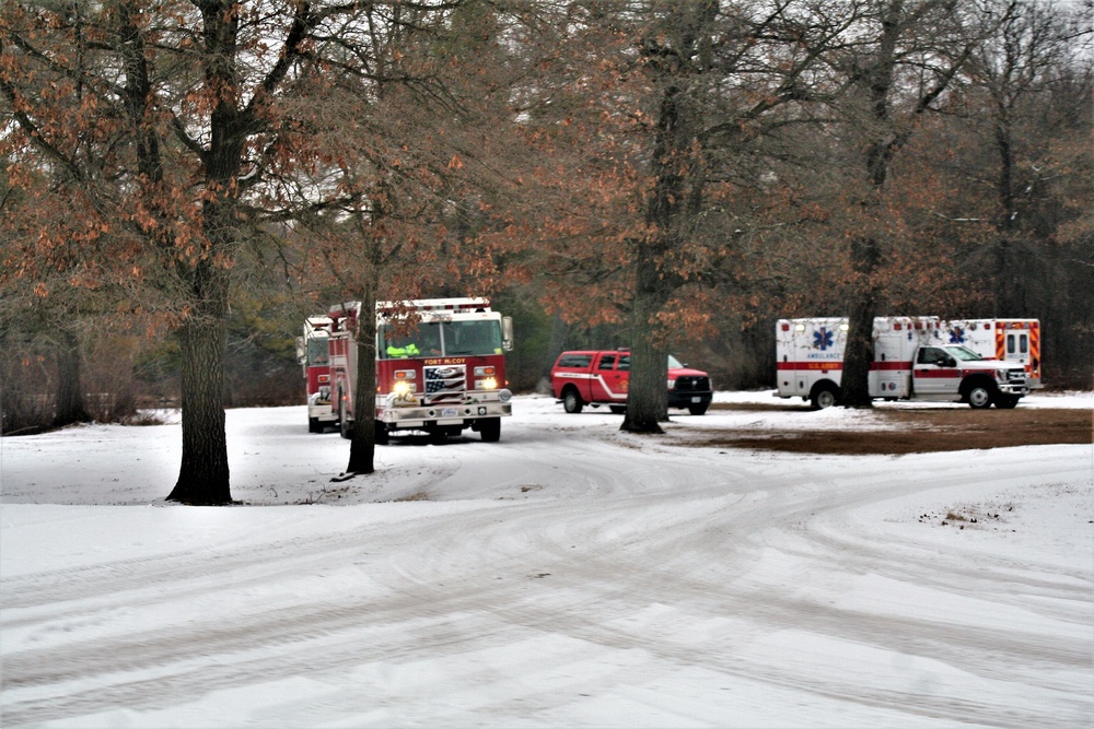 Fort McCoy firefighters practice surface ice rescue training at post's Swamp Pond