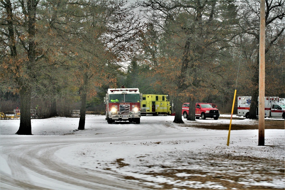 Fort McCoy firefighters practice surface ice rescue training at post's Swamp Pond