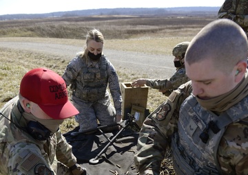 Wright-Patterson Air Force Base Combat Arms Trainers support readiness mission with machine gun training