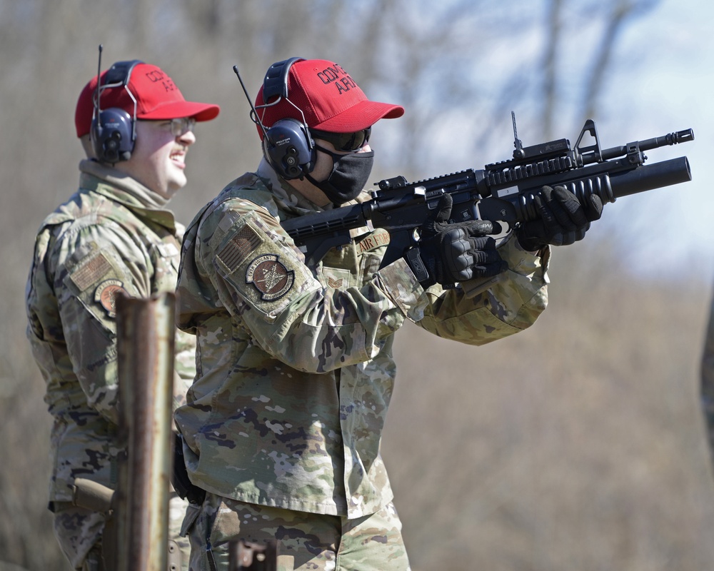 Wright-Patterson Air Force Base Combat Arms Trainers support readiness mission with machine gun training