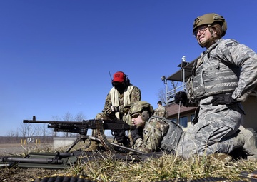 Wright-Patterson Air Force Base Combat Arms Trainers support readiness mission with machine gun training