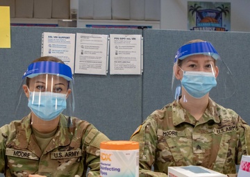 Two Medical Soldiers share a name and calling supporting COVID-19 Vaccination efforts in St Thomas