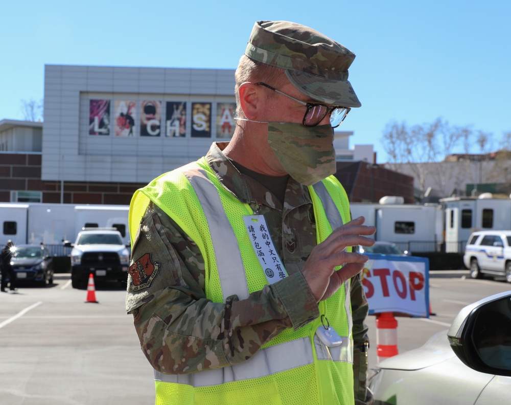 Cal Guard Airman provides Mandarin language assistance at vaccine site
