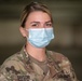 U.S. Army medic stands in recognition of Women's History