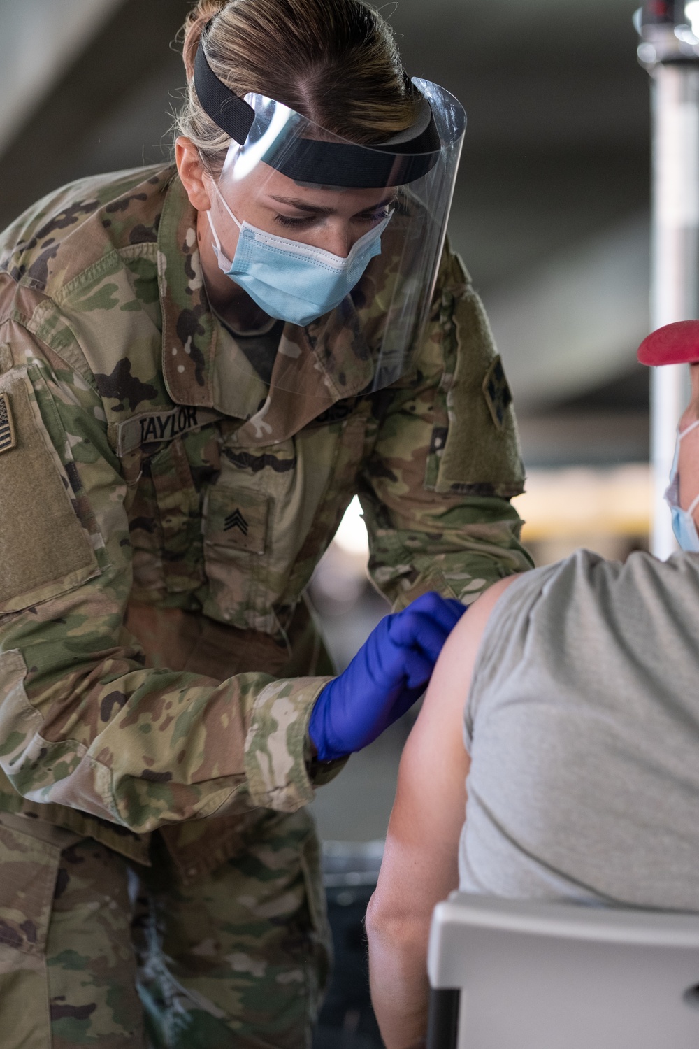 U.S. Army medic stands in recognition of Women's History