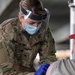 U.S. Army medic stands in recognition of Women's History