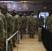 U.S. Soldiers from New Jersey Army National Guard wait in line to outprocess from the Capitol Response mission to return to their home state at the District of Columbia Armory in Washington, D.C., March 14, 2021