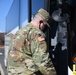 A U.S. Soldier from New Jersey Army National Guard boards a bus after outprocessing from the Capitol Response mission to return to their home state, at the District of Columbia Armory in Washington, D.C., March 14, 2021