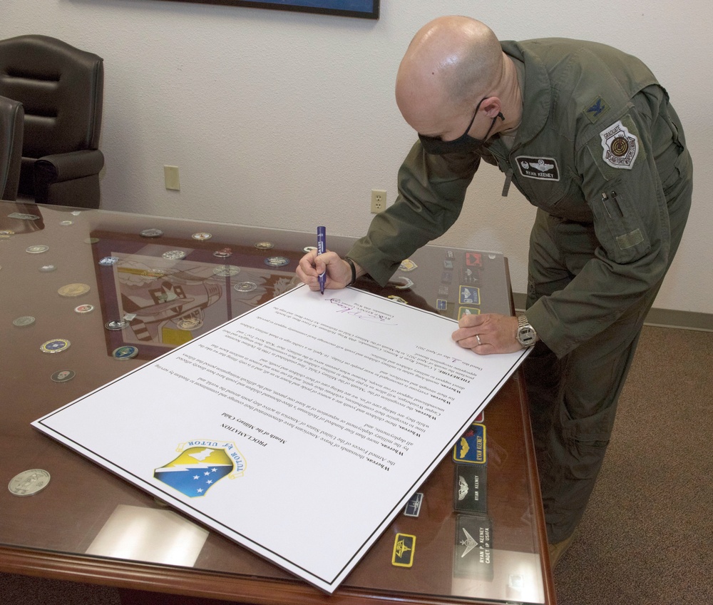 49 Wing command signs Month of Military Child Proclamation