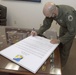 49 Wing command signs Month of Military Child Proclamation