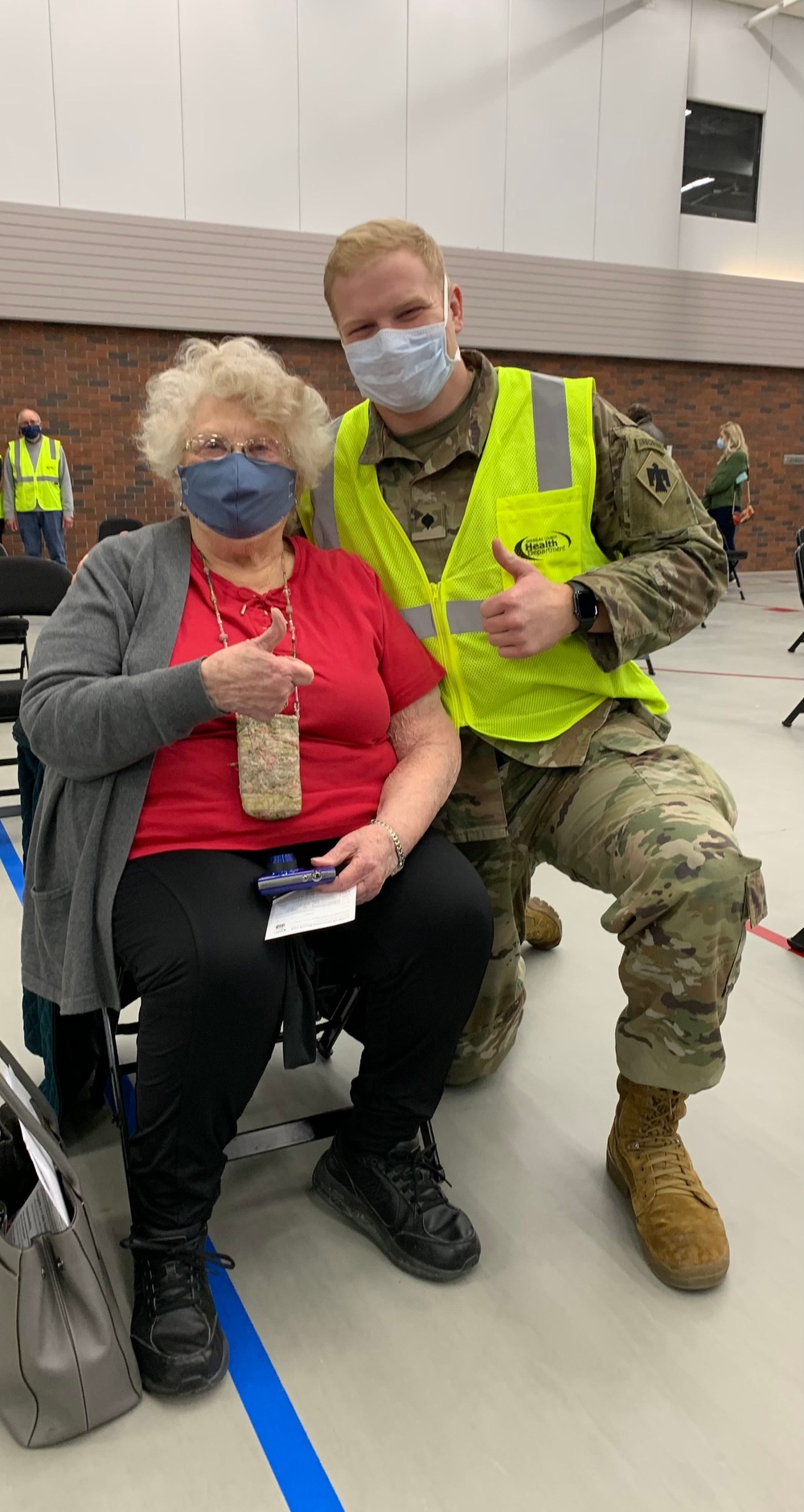 Soldier vaccinates his grandmother