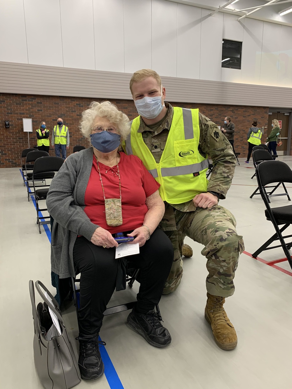 Soldier vaccinates his grandmother