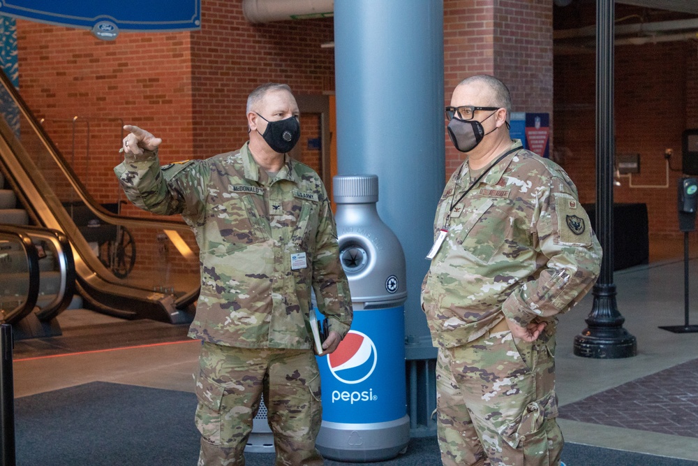 U.S. Air Force and U.S. Army tour Ford Field Community Vaccination Center in Detroit