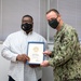 MA1 Damon Harris end-of-tour award ceremony; Civilian length-of-service award ceremony