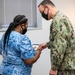 MA1 Damon Harris end-of-tour award ceremony; Civilian length-of-service award ceremony