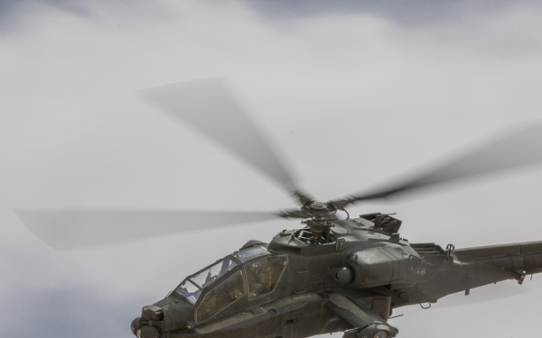 U.S. Army and Air Force Partners with SDF to Conduct AH-64 Live-Fire
