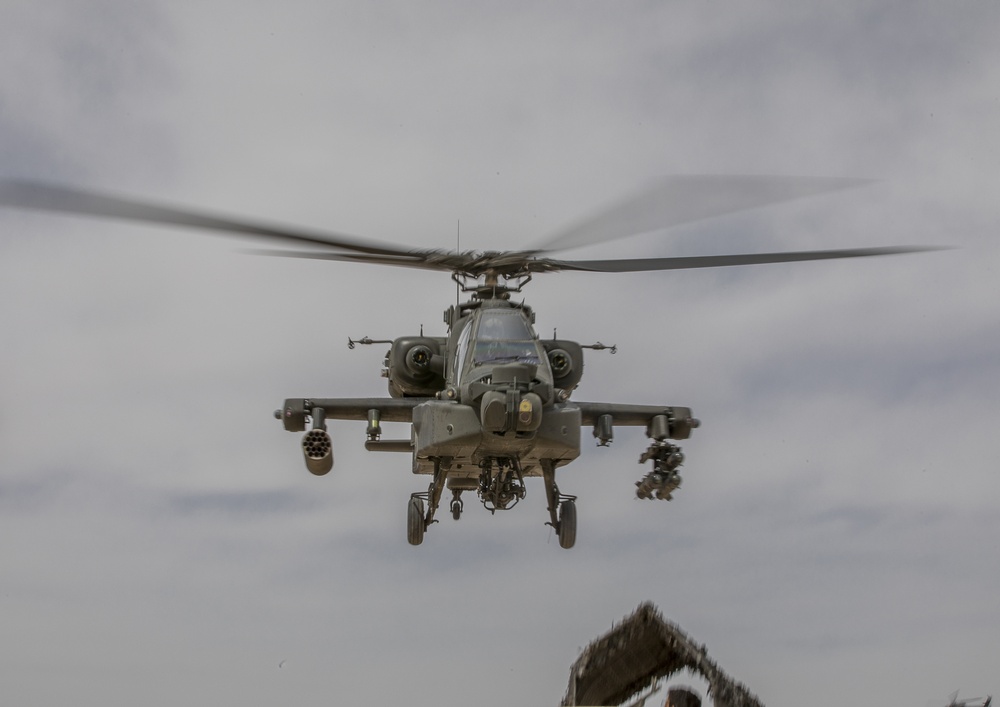 U.S. Army and Air Force Partners with SDF to Conduct AH-64 Live-Fire
