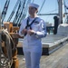 Culinary Specialist 2nd Class Rose Fennell, assigned to USS Constitution, conducts a live tour about the Navy’s first enlisted female Loretta Walsh