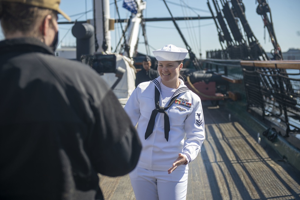 Culinary Specialist 2nd Class Rose Fennell, assigned to USS Constitution, conducts a live tour about the Navy’s first enlisted female Loretta Walsh