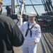 Culinary Specialist 2nd Class Rose Fennell, assigned to USS Constitution, conducts a live tour about the Navy’s first enlisted female Loretta Walsh