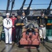 Sailors assigned to USS Constitution pose for a photo on the spar deck