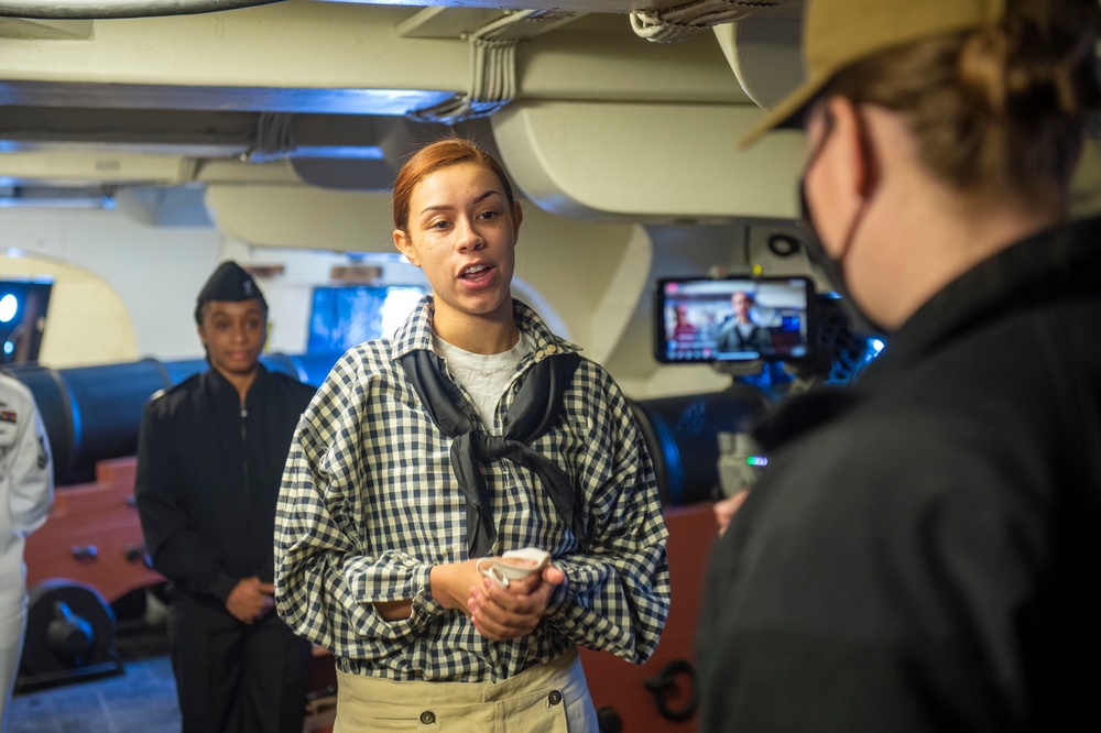 Hospital Corpsman Seaman Katrina Mastrolia, assigned to USS Constitution, conducts a live tour about the Navy’s first enlisted female Loretta Walsh