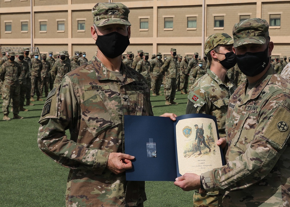 Camp Arifjan deployed Soldiers earn Norwegian Foot March badge under desert sun