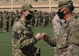 Camp Arifjan deployed Soldiers earn Norwegian Foot March badge under desert sun