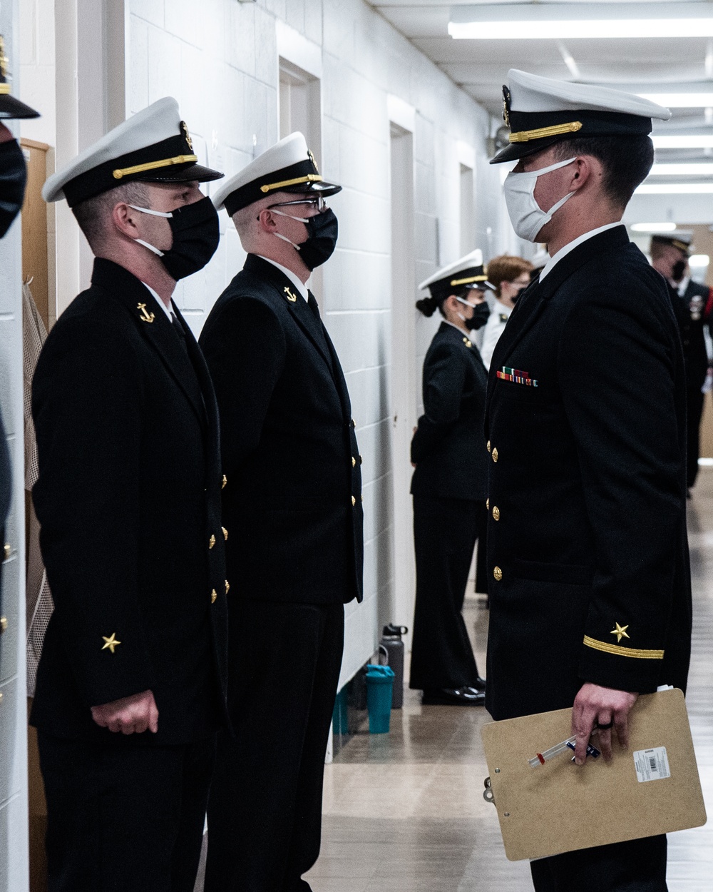 210318-N-TE695-0002 NEWPORT, R.I. (March 18, 2021) Naval Science Institute Seaman-to-Admiral (NSI/STA21) class 21010 conduct uniform inspections