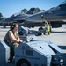 South Dakota Air Guardsmen load munitions on F-16s