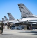 South Dakota Air Guardsmen load munitions on F-16s