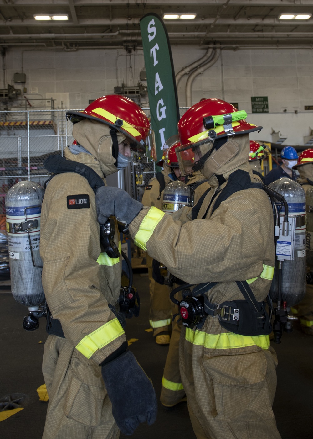 GHWB and Truman Sailors Conduct Joint Shipboard Fire Drill