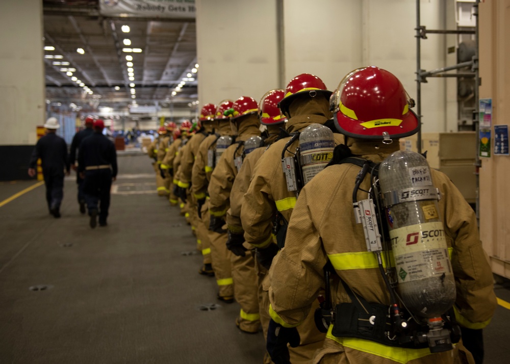 GHWB and Truman Sailors Conduct Joint Shipboard Fire Drill