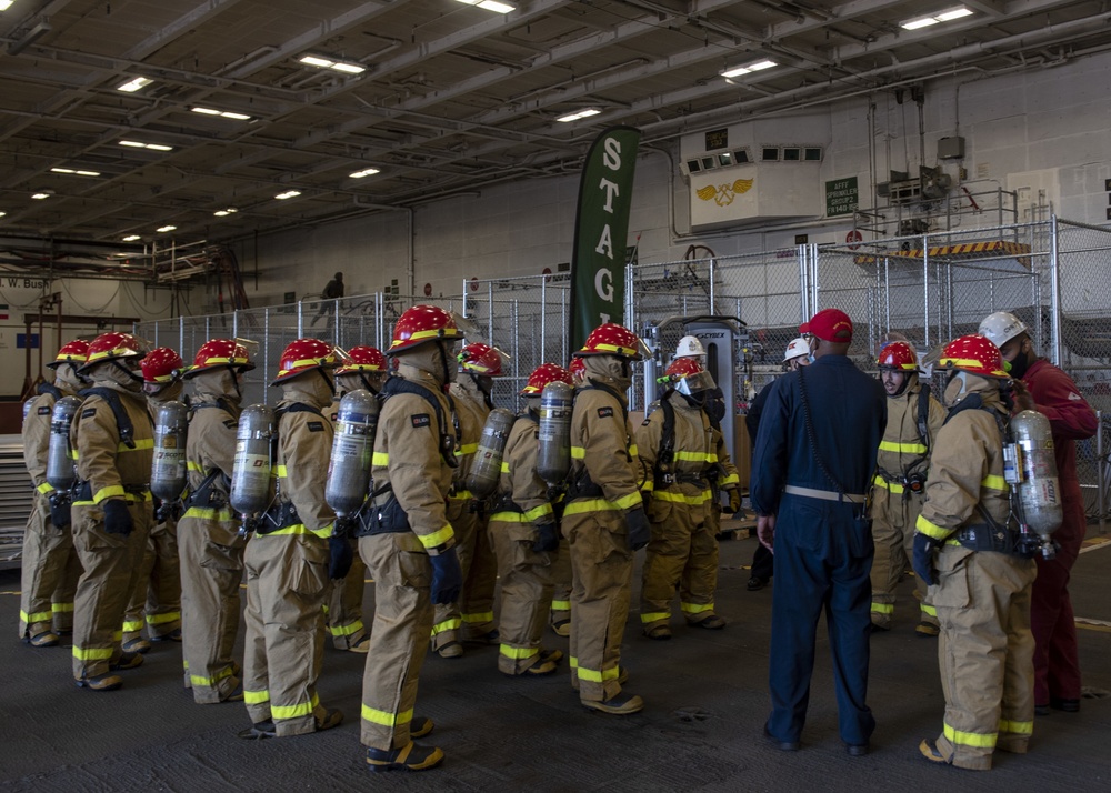 GHWB and Truman Sailors Conduct Joint Shipboard Fire Drill