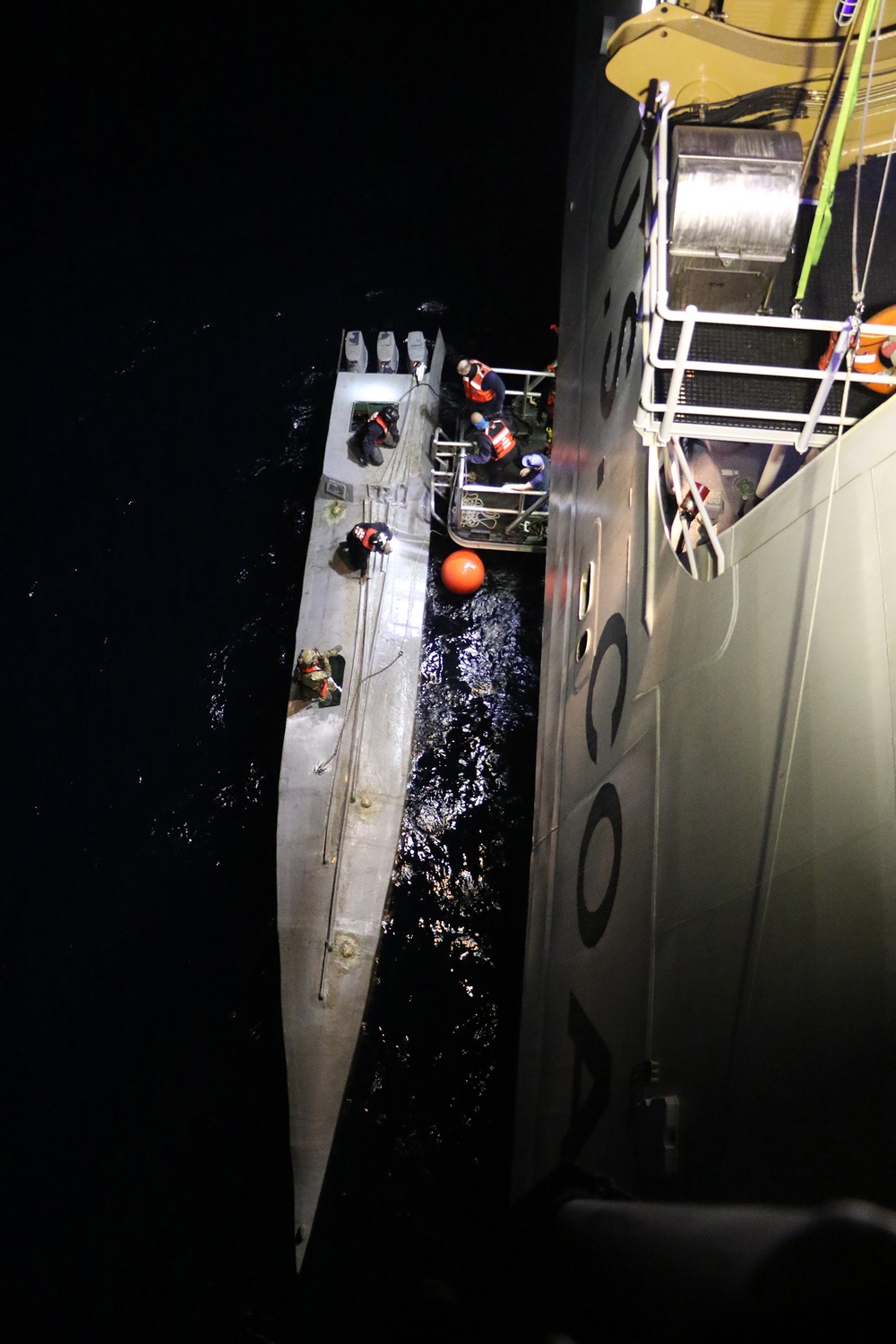 Coast Guard Cutter Munro takes possession of suspected drug smuggling vessel