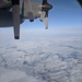 Minnesota Air National Guard C-130 Hercules flies over Greenland for participation in Arctic Air Defense Exercise AMALGAM DART