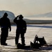 U.S. Air Force Airmen from the 148th Maintenance Squadron await the arrival of F-16s at Thule Air Base