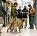 U.S. Customs and Border Protection Patrol K-9 Agents conduct narcotics detection training hosted by Maritime Expeditionary Security Group (MESG) 1 Training Evaluation Unit.