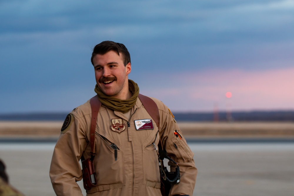 C130J Hercules crew debark at sunset