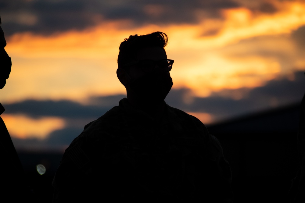 C130J Hercules crew debark at sunset